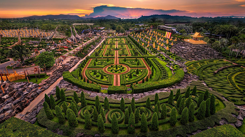 ประกวดภาพถ่ายโดรนและภาพ 360 องศา สวนนงนุช 2569 of a colorful circular garden surrounded by lush greenery